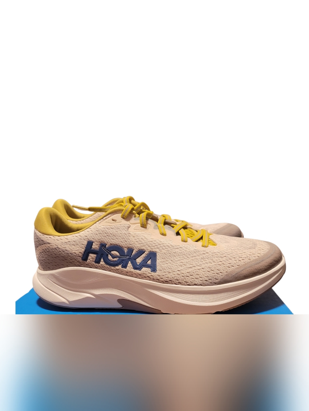 Hoka Mens One One Beige Running Shoes with Yellow Accents and Blue Logo